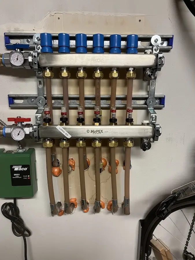 Plumber performing Sink Repair at a residential property in Sheridan